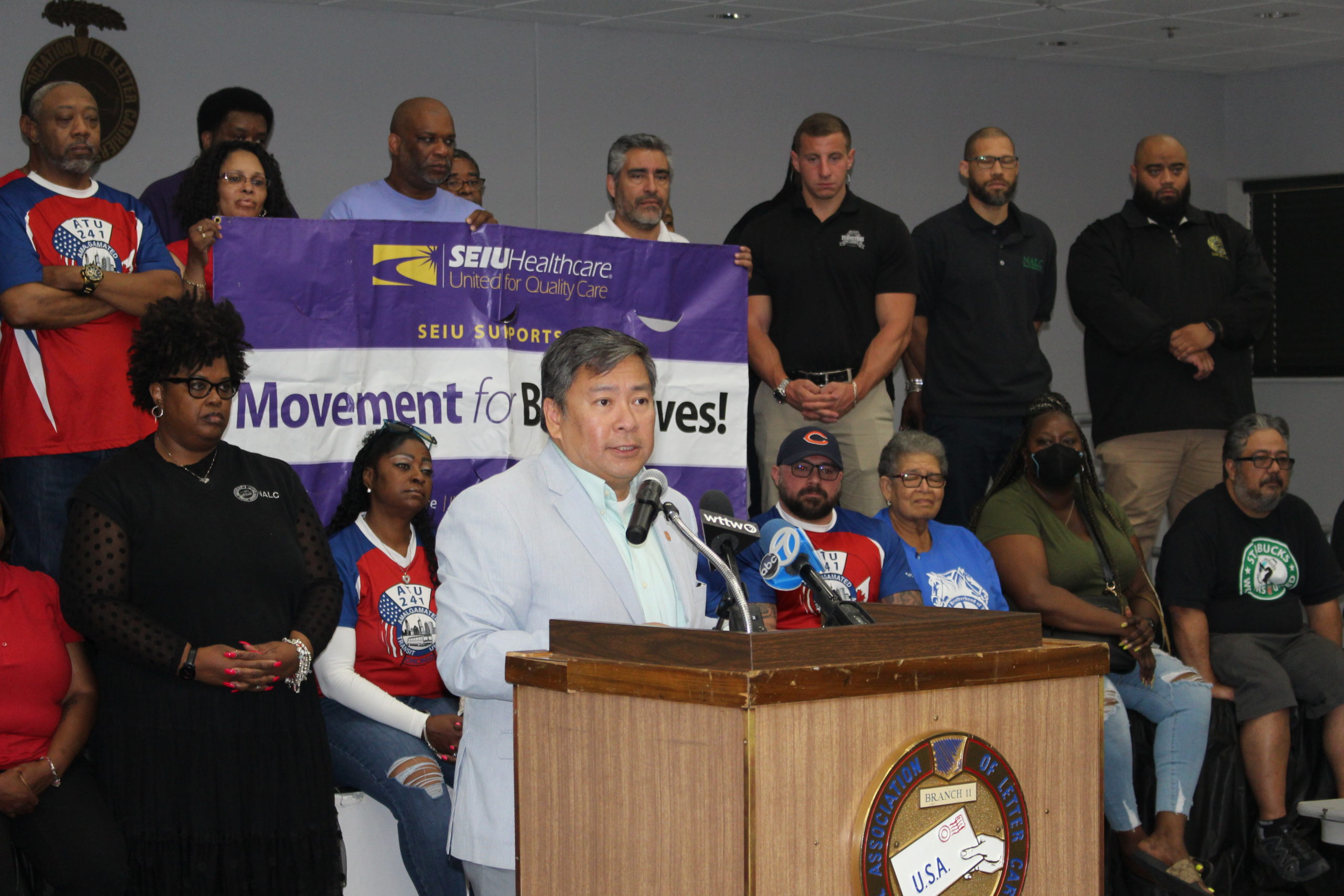Chicago Federation of Labor Secretary-Treasurer Don V. Villar reads the CFL's Anti-violence Statement with the support of the Labor Movement behind him at NALC Bracnh 11 union hall press conference on June 24. 